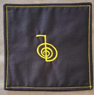 Untersetzer Reiki schwarz gelb mit Rahmen